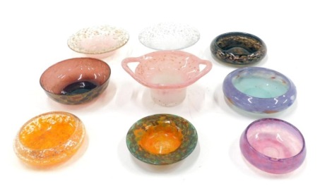 A collection of Art Glass, comprising mainly small pin dishes and bowls, each on pink and purple ground with gilt decoration.