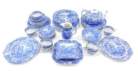 A large quantity of blue and white wares, comprising Copeland Spode Italian and others, teapot, coffee pot lacking lid, bowl, teapot stand, serving plates, dinner plates, saucers, etc., in varying patterns and brands. (2 trays)