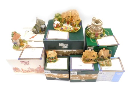 Seven Lilliput Lane cottages, comprising The Golden Jubilee, Welcome Gnome, Birthday Cottage, Round Tower Windsor, Cabbage Patch Corner, Moonlit Cove, Tea Caddy Cottage, boxed with deeds.