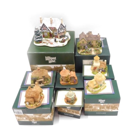 Seven Lilliput Lane cottages, comprising The Three Kings, Little Scrumpy, Hobb's House, Look to the Stars, Gold Top, Little Bee, Little Water Mill, and Beatrix Pottery Hilltop, boxed with deeds. (7)