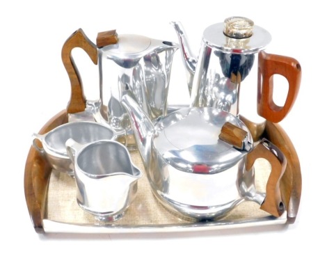 A Piquotware five piece aluminium tea set, comprising teapot, coffee pot, milk jug, sugar bowl, serving tray, and a Boda stainless steel teapot.