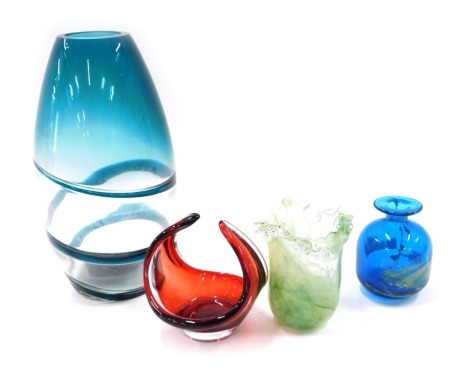 A collection of Art Glass, comprising a blue swirl design vase, 26cm high, green mottled vase, 11cm high, red handkerchief bowl, and a Mdina glass turquoise squat vase, 11cm high. (4)