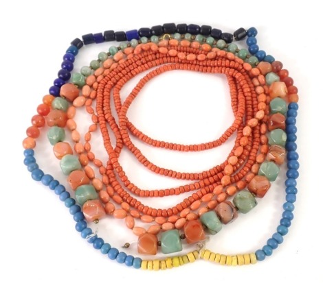 Hardstone necklaces, comprising two coral Longuard chains, a Jadeite and agate chunky neck chain, lapis neck chain etc. (a quantity)