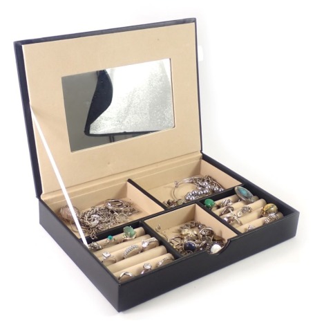 A black leatherette jewellery box and contents, comprising white metal dress rings, a white metal and marcasite bar brooch, blister pearl drop earrings, star ring, etc.