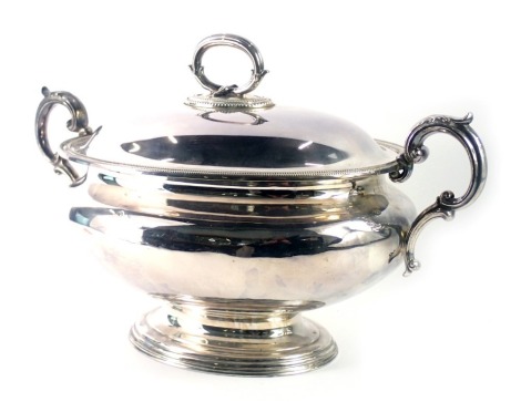 A late 19th/early 20thC Elkington and Co silver plated tureen and cover, with camphor leaf scroll handles, of oval form numbered 12742, 27cm high, 38cm wide.