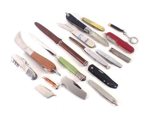 Pocket knives, comprising Swiss army knife, a green hard stone handled letter opener, stainless steel blades, lake district commemorative blades, etc. (1 tin)