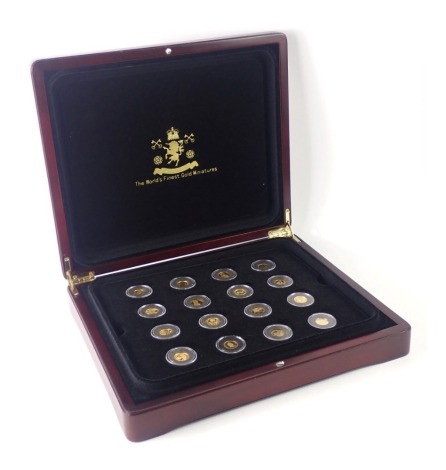 A cased part set of World gold miniatures, comprising each one dollar gold coins, with gloves and magnifying glass. (16)