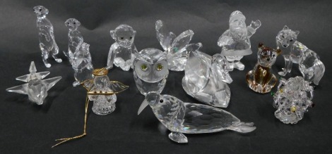 A group of Swarovski crystal and other ornaments, comprising beaver, monkey, cat, swan, walrus, fox, butterfly, owl, airplane, Christmas tree, Santa, and angel. (a quantity)