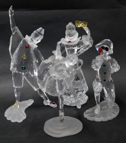 Four Swarovski crystal figures, comprising 00GS, Melt Harlequin GIA11, ballerina, and gentleman with multicoloured buttons. (4)