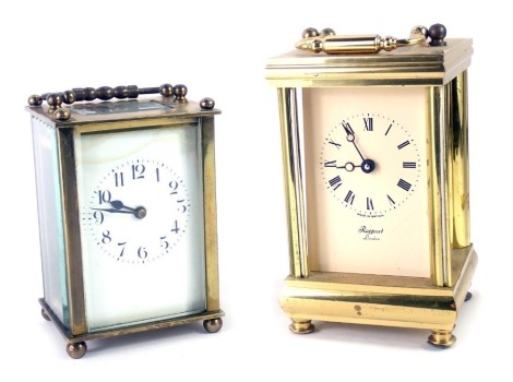 Two brass cased carriage clocks, comprising a late 19thC example with white enamel numeric dial, and an openwork movement, stamped France, 10cm high, and a later Rapport of London example. (2, AF)