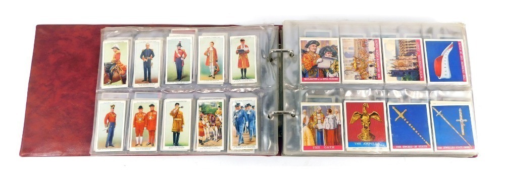 cigarette cards auctions A cigarette card album, containing contents of Wills Royalty cigarette cards, Players Army and Naval related cigarette cards auctions A cigarette card album, containing contents of Wills Royalty cigarette cards, Players Army and Naval related