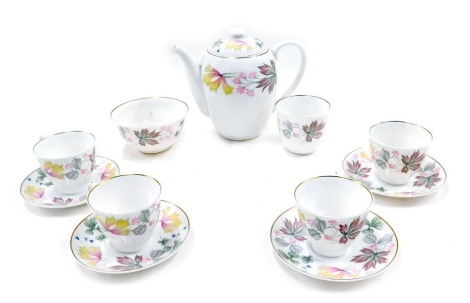 A Shelley porcelain Columbine pattern part coffee service, comprising coffee pot, cream jug, sugar bowl, four cups and saucers.