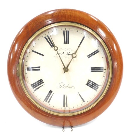 A late 19thC mahogany circular cased wall clock, the dial bearing name I&A Mark of Peterborough and Roman numerals, with weights, 31cm diameter.