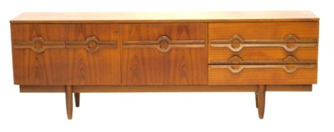 A teak 'long john' sideboard, 215cm wide. (AF)