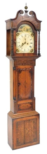 A Georgian oak and mahogany longcase clock by William Green of Grantham, the enamelled break arch dial painted with an homestead and shell spandrels, dial bearing Roman numerals, subsidiary seconds dial, eight day two train movement with bell strike, the