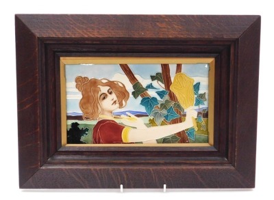 Carl Sigmund Luber (German 1868-1934). An Art Nouveau pottery tile, for Johann von Schwarz, depicting a woman before a landscape holding a hand mirror, framed and glazed, tile 18.5cm x 30cm. - 2