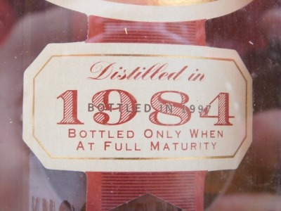 A bottle of Knockando Pure Single Malt Scotch Whisky, 1984, 70cl, bottled in 1997, boxed. - 2