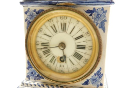 A 19thC Delft ware blue and white miniature long case clock, circular enamel dial bearing Roman and Arabic numerals, thirty hour movement, the case hood painted with a river scene and flowers, the trunk with figures in a landscape, on a base further paint - 2