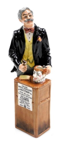 A Royal Doulton figure modelled as The Auctioneer, HN2988.