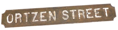 An early 20thC painted cast iron street sign, for Ortzen Street, Nottingham, 121cm wide. NB. We have specific vendor instructions to sell WITHOUT RESERVE.