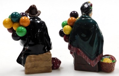 A Royal Doulton figure modelled as The Balloon Man, HN1954, together with a figure modelled as The Old Balloon Seller, HN1315. (AF, 2) - 2