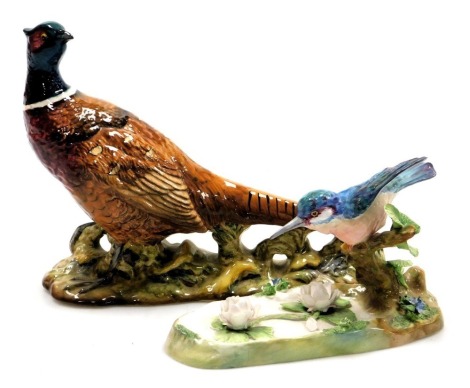 A Beswick pottery figure of a pheasant, no. 1225, impressed marks, together with a Crown Staffordshire figure of a Kingfisher, designed and modelled by J T Jones, printed marks. (2, AF)