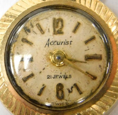 A mid century Accurist 9ct gold cased lady's circular wristwatch, champagne dial bearing Arabic numerals at 12 and 6, on a leather strap. - 2