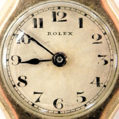 A mid century Rolex 9ct gold cased lady's wristwatch, circular dial with engine turned decoration, bearing Arabic numerals, on a plated bracelet strap. - 2