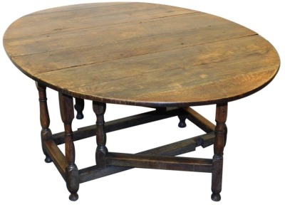 A 18thC and later oak gate leg dining table, raised on baluster turned supports united by a box stretcher, 71cm high, 122cm wide, 53.5cm deep, 162cm extended. - 2