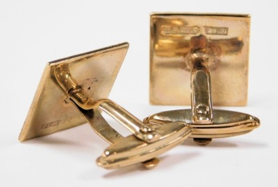 A pair of gentleman's gold cuff links, the square face with engine turned decoration, cased, 8.8g. - 2