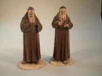 A pair of 19thC German/Austrian carved softwood figures of monks