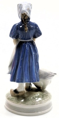 A Royal Copenhagen porcelain figure of a girl with a goose, no. 527, printed and painted marks, 24cm high. - 2