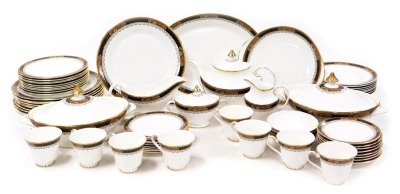 A Royal Doulton porcelain Verona pattern part dinner and tea service, comprising a pair of vegetable tureens and covers, meat platter, sauce boat on stand, ten dinner and dessert plates, eight soup plates, nine side plates, four fruit bowls, teapot, bread