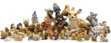 A group of Wade Whimsies, KP Friar figures, figure of Tom from Tom and Jerry, dinosaurs, and Lady and the Tramp figures, together with a Wade Bambi money box, Royal Albert Beatrix Potter figure of Benjamin Bunny, etc. (a quantity)