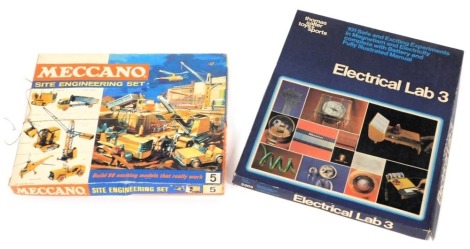 A Meccano Site Engineering Set, number 5, together with a Thomas Salter Toys and Sports Electrical Lab 3, both boxed. (2)