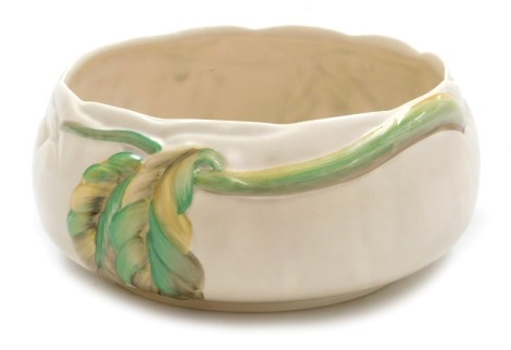 A Clarice Cliff Newport pottery fruit bowl, moulded with leaves, printed mark, 33cm wide.