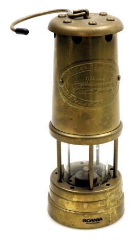 A British Coal Mining Company brass miner's lamp, Aberaman Colliery, serial number 207349, 21.5cm high.