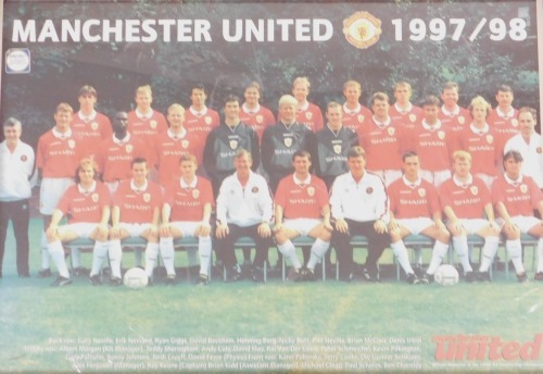 A Manchester United official magazine 1997/98 squad poster, framed, 41cm x 59cm.