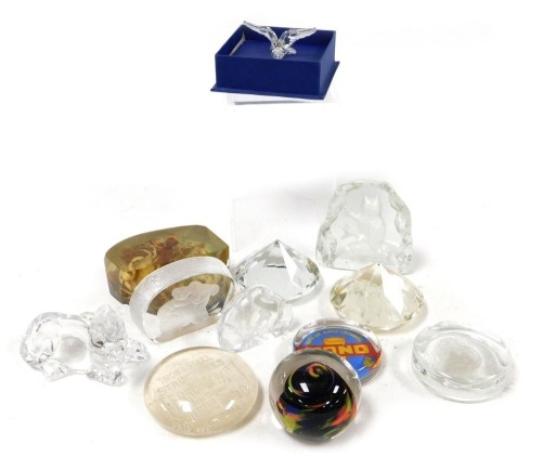 A group of paperweights and sculptures, including advertising weights for Griffiths Bros and Company Ferrodor Paint, Mono Containers Limited paper and plastic containers, a Women's Royal Army Corps weight, Swarovski dove of peace, and a signed paperweight