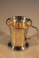 A George V silver christening mug with flared border