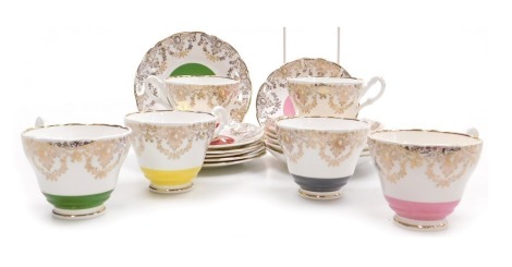 A Winston China porcelain harlequin part tea service, with gilt swags and medallions decoration, printed marks, comprising six cups, saucers and plates.