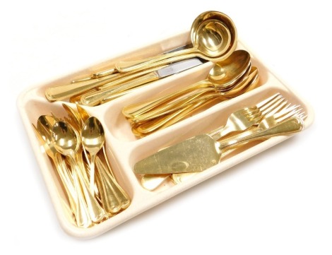 A group of German gold plated cutlery by SBS, including soup and cream ladles, cake slice, dessert and soup spoons, teaspoons, table and cake knives and table knives. (a quantity)