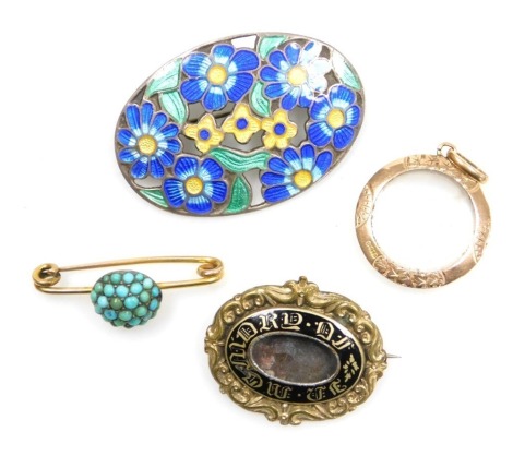 A Victorian 9ct rose gold photo pendant locket, Victorian gilt metal and black enamel "In Memory Of" memorial brooch, turquoise set pin brooch, yellow metal, and a silver and enamel oval floral brooch. (4)