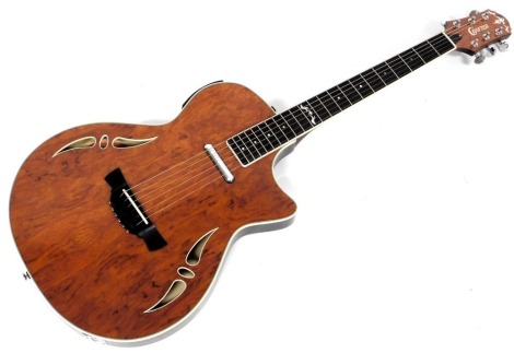 A Crafter hybrid SA-Bubinga acoustic electric guitar, serial no. 11070011, cased.