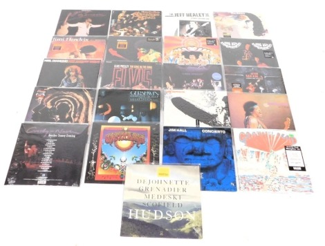 LP records, some of them remastered, including The Doors, Jimmy Hendrix, Crosby Stills, The Rolling Stones, Led Zeppelin and The Grateful Dead.