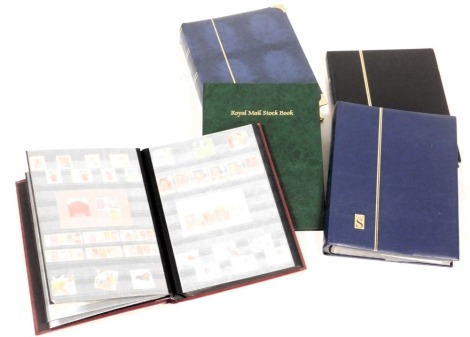 Philately. GB mint commemoratives, in sets and higher value blocks, and some definitives, in five albums or stock books.