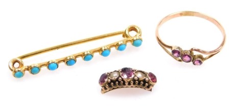 A Victorian amethyst three stone ring, in a diagonal setting, within rose metal, size P/Q, 1.1g a Victorian ring head set with three amethysts and two seed pearls, 0.8g, and a turquoise seven stone pin brooch, in yellow metal, stamped 15c, 2.4g. (3)