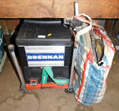 A Drennan fishing stool and a quantity of hoses.