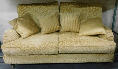 A Multi York two piece suite, comprising of a gold striped upholstered single armchair and a two seater sofa. - 2