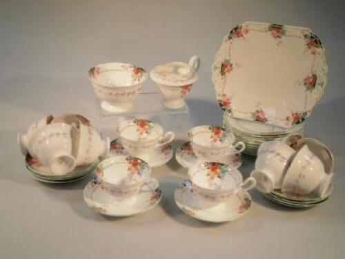 An early 20thC Shelley part tea service transfer printed with grapes and fruit.